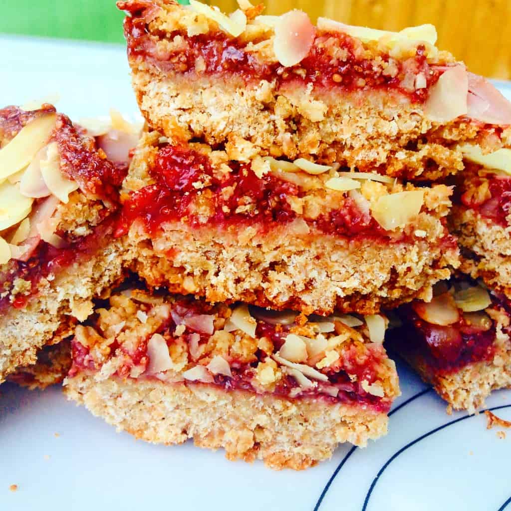 Breakfast peanut slices with almonds and strawberry chia jam