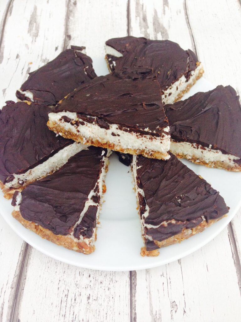 Bounty cake recipe which is healthy, gluten free, vegan, made with raw chocolate, coconut milk, some nuts and a bit of love? Yes, we are doing this! #veganrecipes #healthycake #coconutcake #bountycake #bounty #glutenfree #dairyfree 