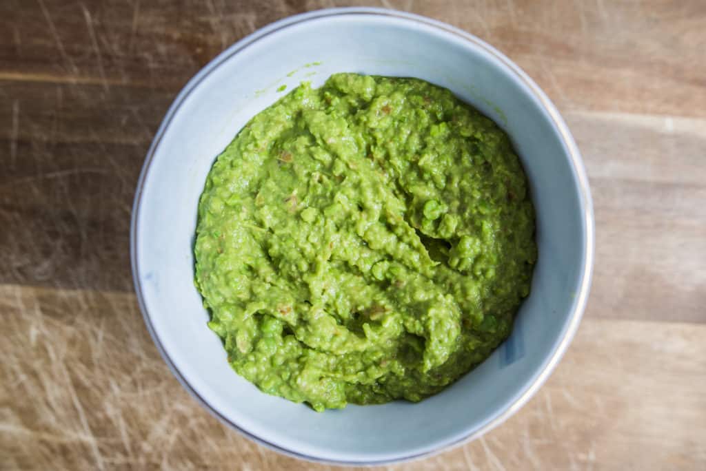 Delicious light guacamole recipe with a secret ingredient to lighten it up while still being creamy with a wonderful texture.