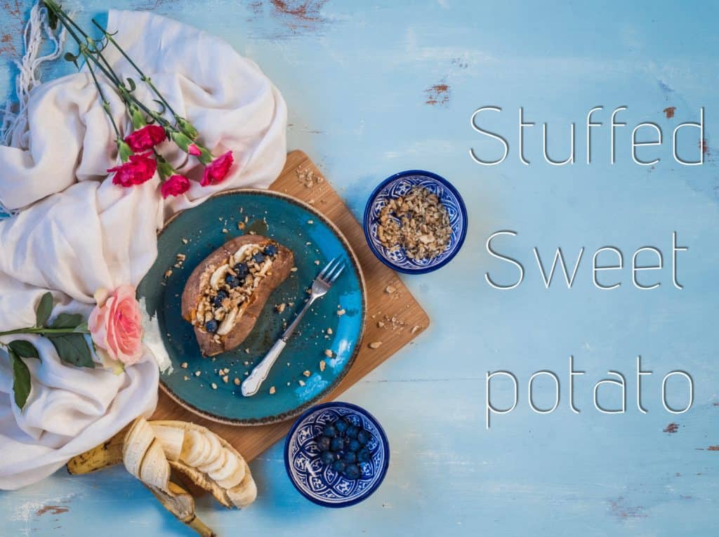 Stuffed breakfast sweet potato recipe is an easy, filling, healthy breakfast recipe that's perfect to serve at breakfast time, brunch, afternoon snack or include in your weekly meal prep. Its' #glutenfree, #vegan #dairyfree and #paleo friendly too!