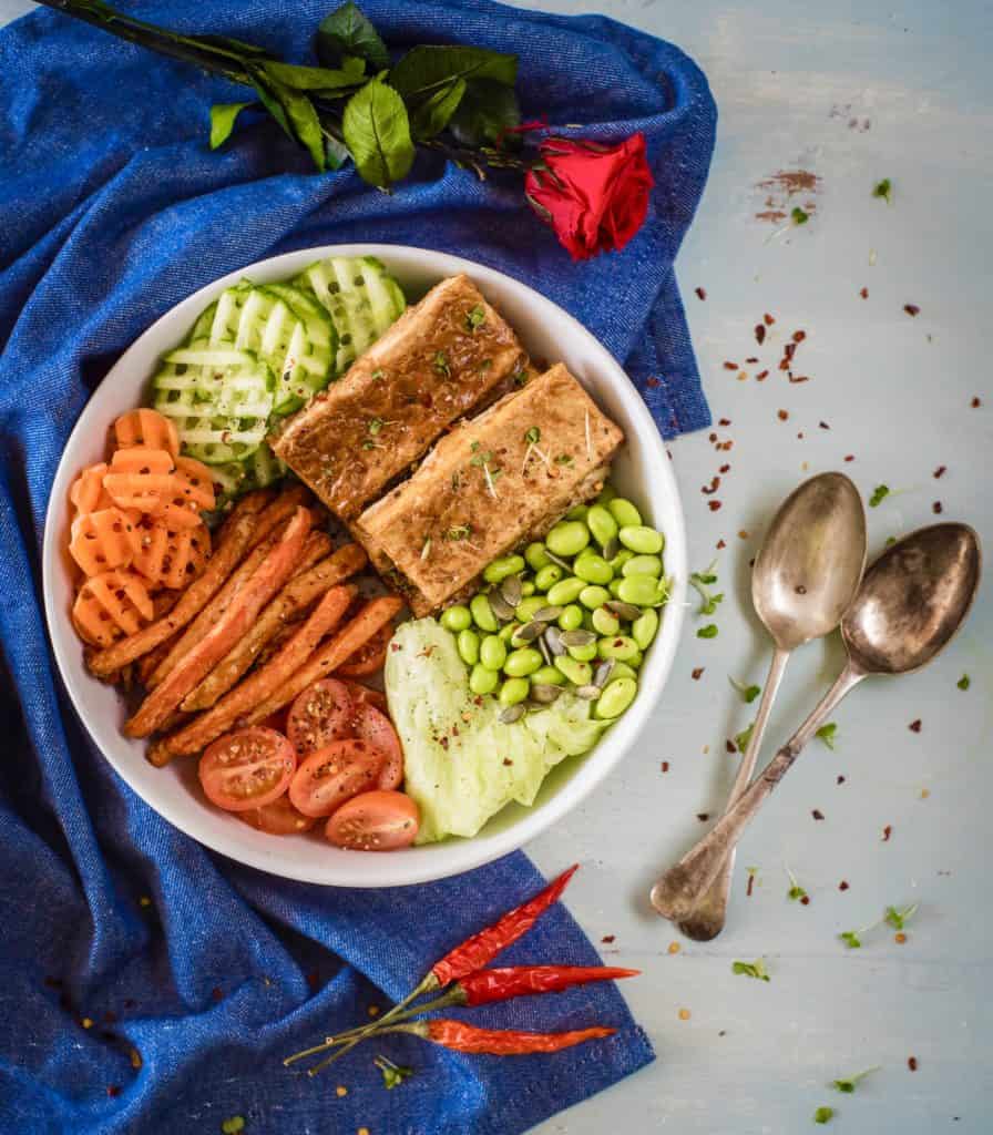 Beautiful and very easy peanut butter baked tofu Buddha bowl recipe perfect for any time, any day. No gluten, no dairy, just wholesome ingredients and loads of veggies #vegandinner #planbasedfood #veganmeals #tofurecipes