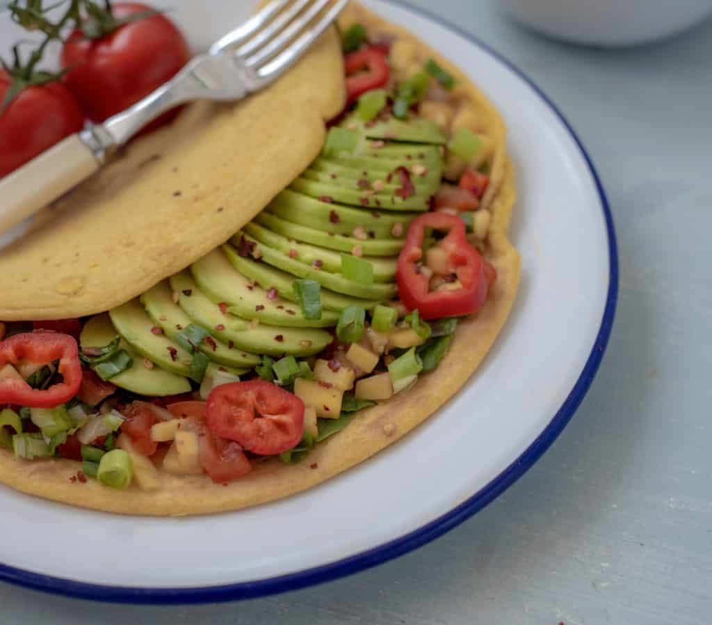 This delicious Chickpea Omelette with Avocado and Mango Salsa recipe omelette is a brilliant savoury breakfast idea, quick & light lunch or the perfect weekend brunch dish. It's vegan, gluten, nut and dairy free too! #veganrecipes #dairyfreerecipes #healthyfoods #wholefoods #fastfreshfood