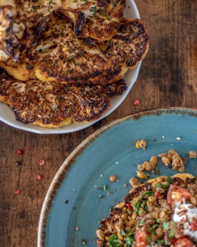 Cauliflower steak with smoky spinach lentils recipe is packed with protein, fiber, flavour, and makes a great weeknight dinner. It's vegan and gluten-free. #cleaneatingvegetarian #cleaneatingvegan #cauliflowerrecipes #meatfree #meatless #cleanrecipes #cleandinner #vegandinner #veganlunch #healthyrecipes #healthydinner 