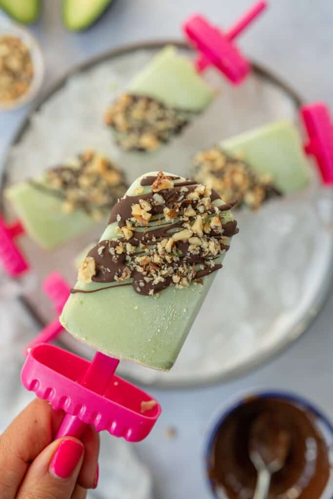 These Avocado Ice Lollies are lush, creamy and utterly delicious. You need only 5 ingredients and a blender. Vegan & Gluten-Free.