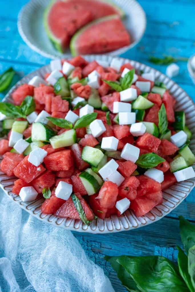 Vegan Watermelon Feta Salad tossed with cucumber, basil, and fresh lemon juice. The perfect watermelon salad for summer!